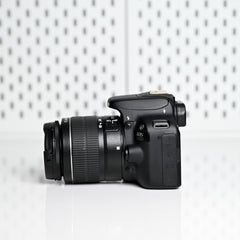 Canon SL1 (100D) con lente 18-55mm Usada impecable